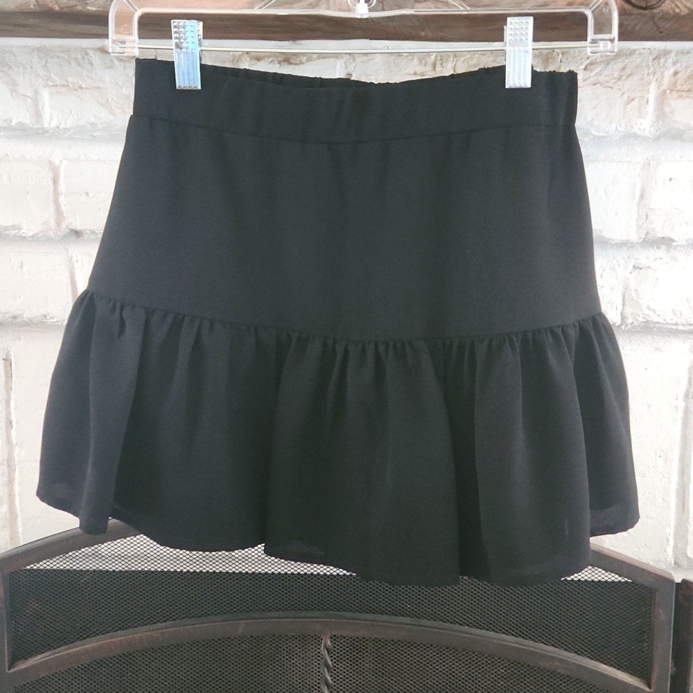 Cute black mini skirt by Impeccable Pig. Zips up the side, great condition! - Picture 2 of 9